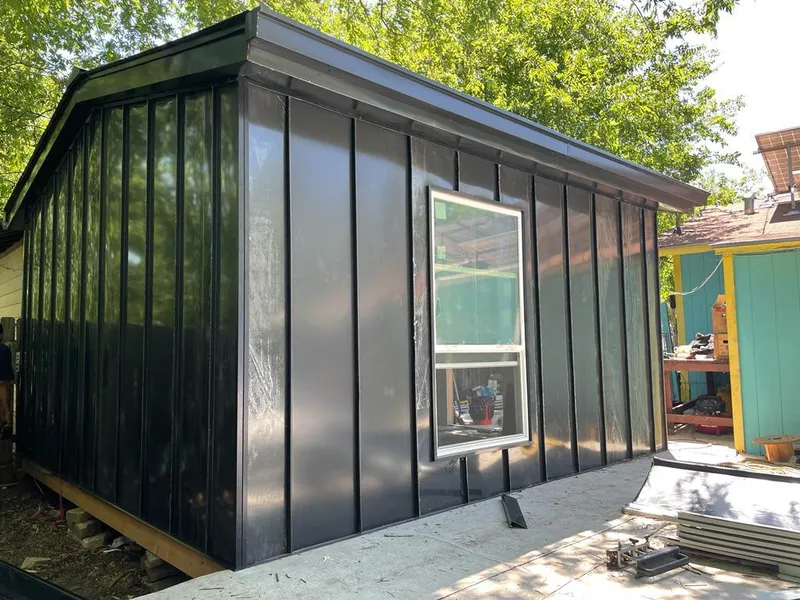 Black standing seam metal wall panels for Metal Roof Installation in Windsor Heights